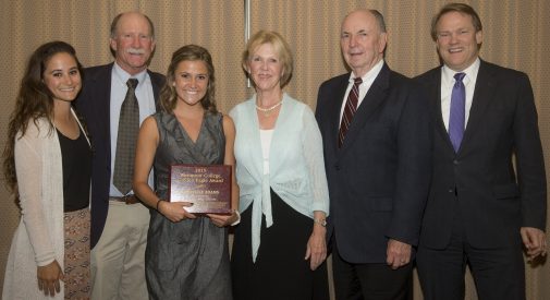 Christine Adams with coaches Chantel Cappuccilli and Dan Ribbens, the Jordano's and President Beebe